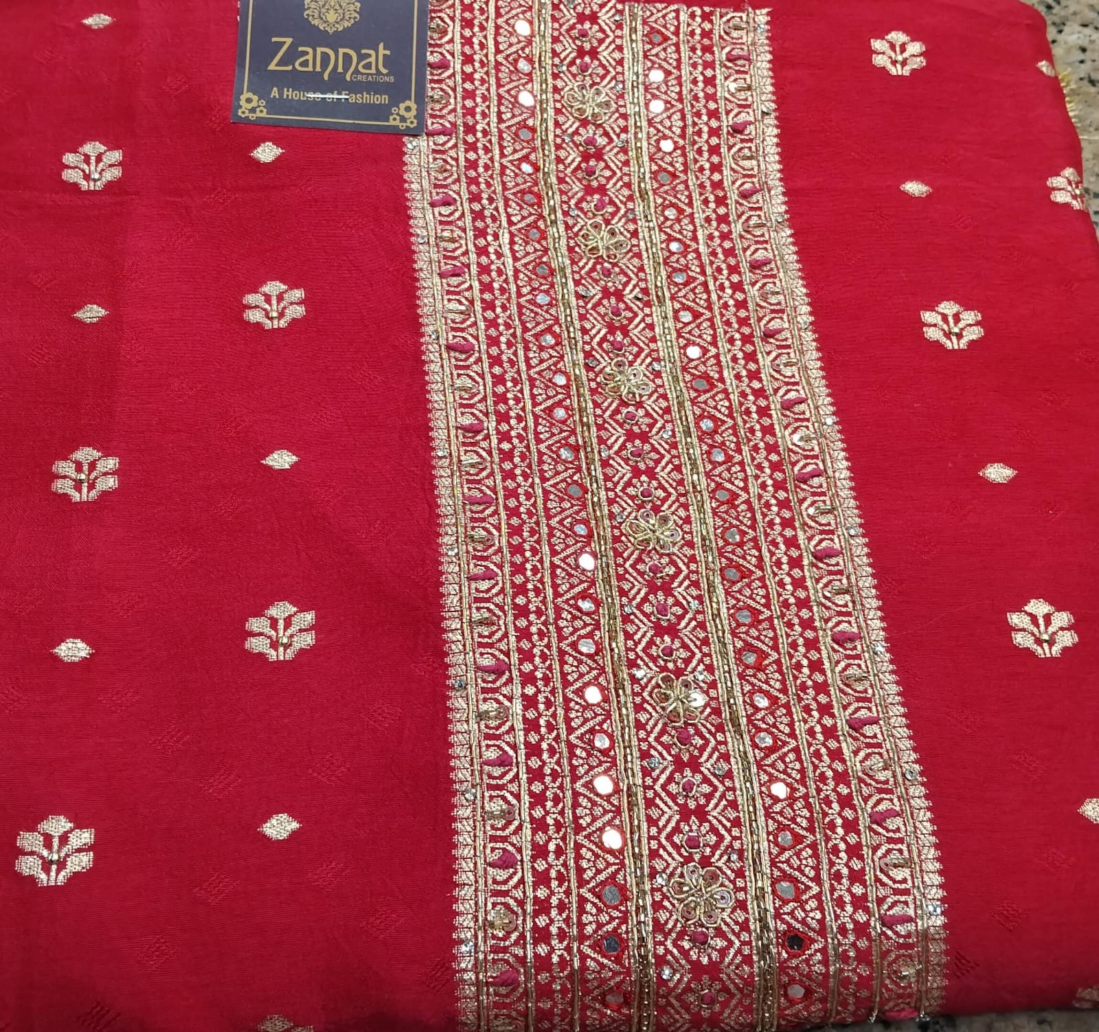 pure banarasi very beautiful silk suit with neck embroidery highlighted on it pure banarasi very beautiful silk suit with neck embroidery highlighted on it