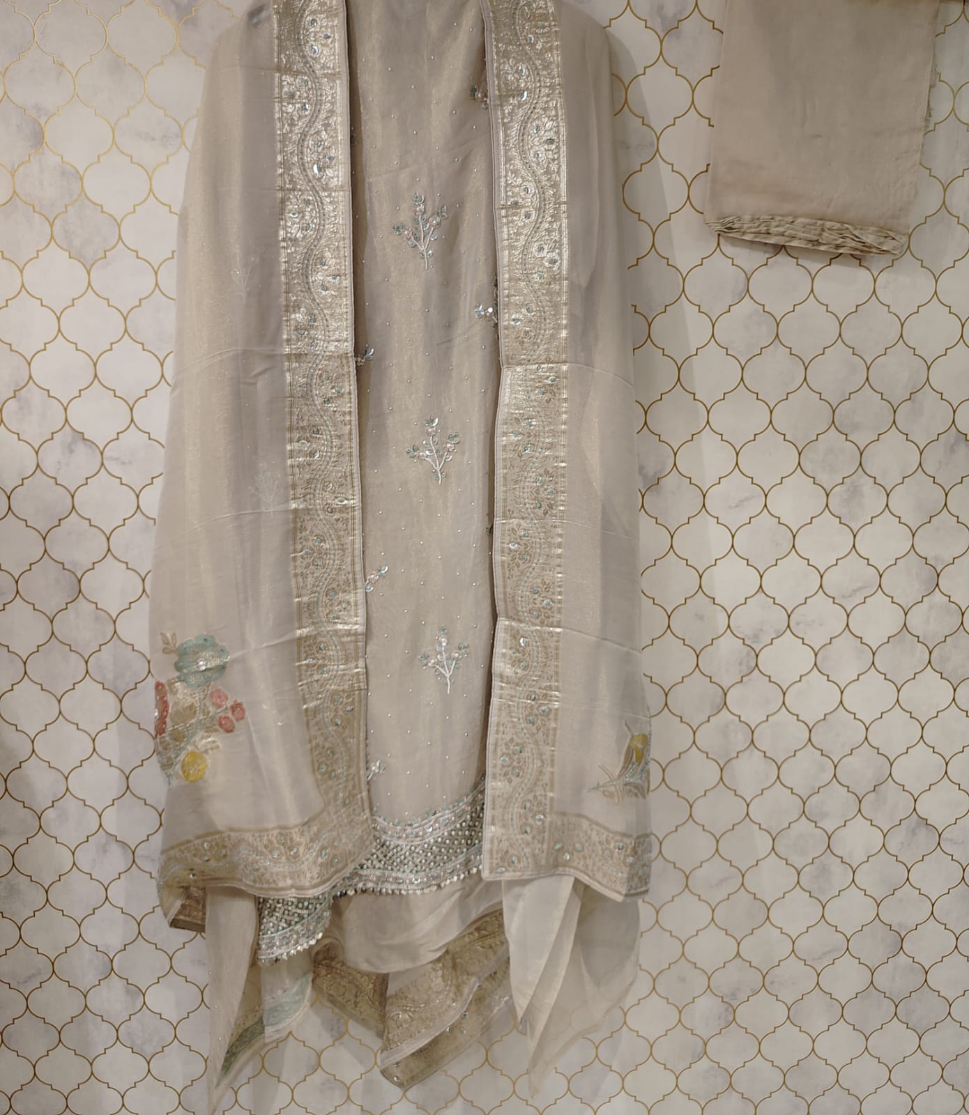 pure tissue with pearls and sequence buties on suit pure tissue with pearls and sequence buties on suit