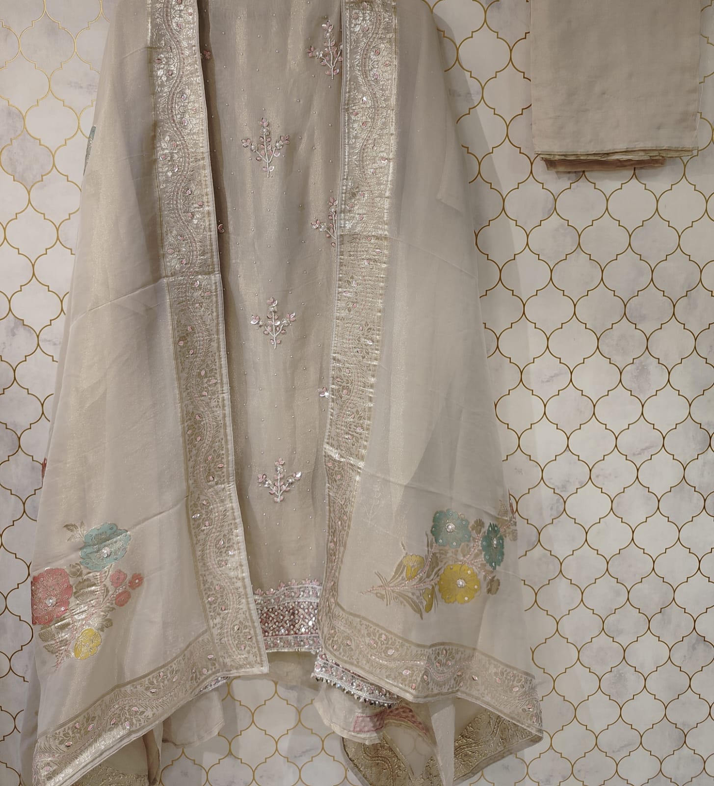 pure tissue with pearls and sequence buties on suit pure tissue with pearls and sequence buties on suit