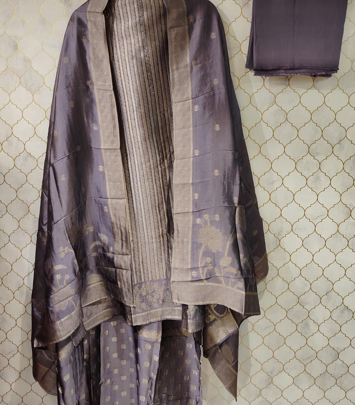 pure banarasi brocade suit with kurta patti neck highlighted with cutdana pure banarasi brocade suit with kurta patti neck highlighted with cutdana