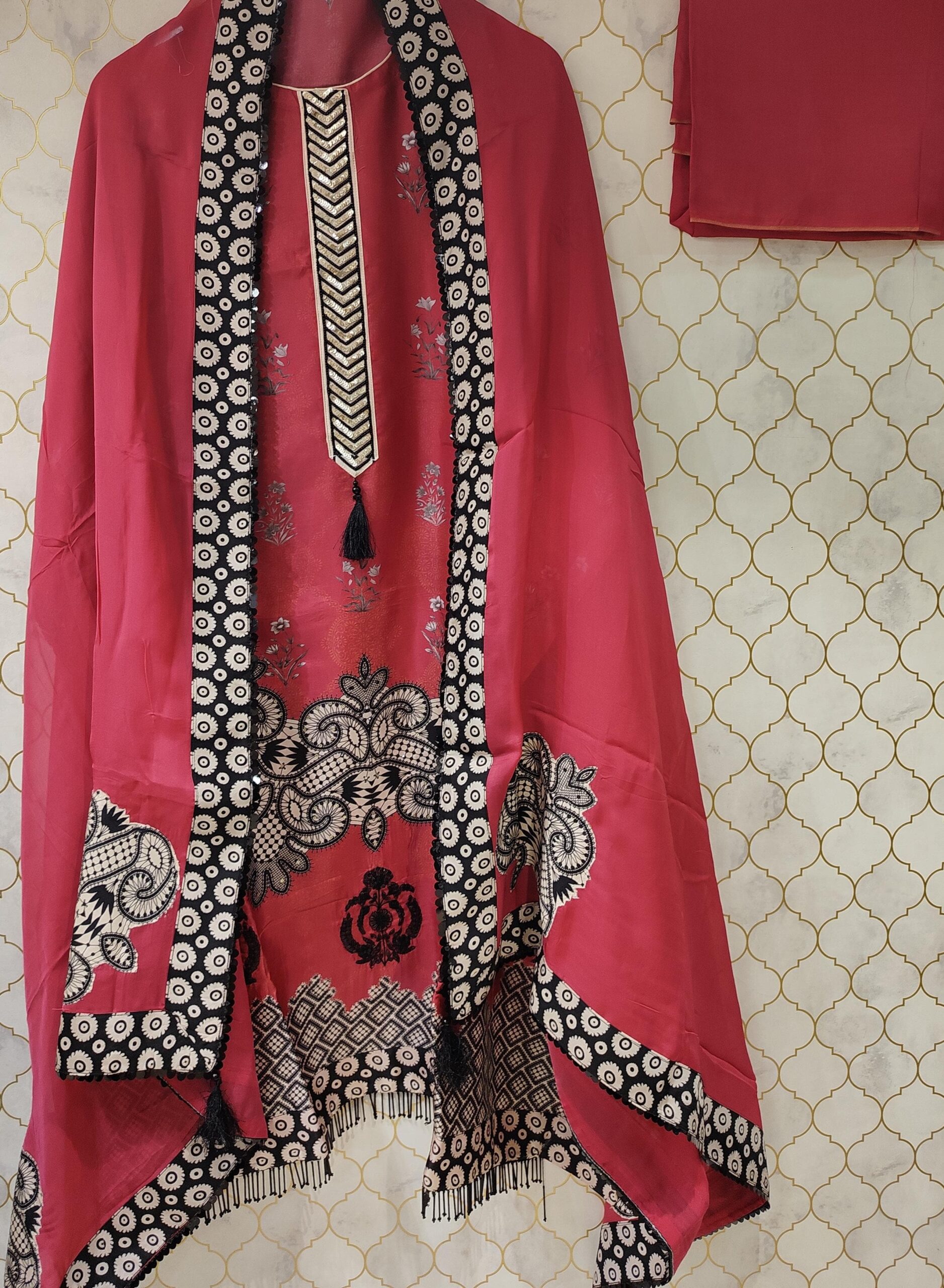 pure printedsuit with tussur silk with kurta patti neck highlighted with sequence pure printedsuit with tussur silk with kurta patti neck highlighted with sequence