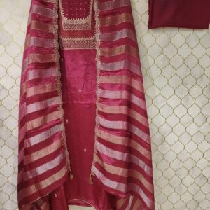 pure silk suit with zari detailing on neck with sequence highlighted