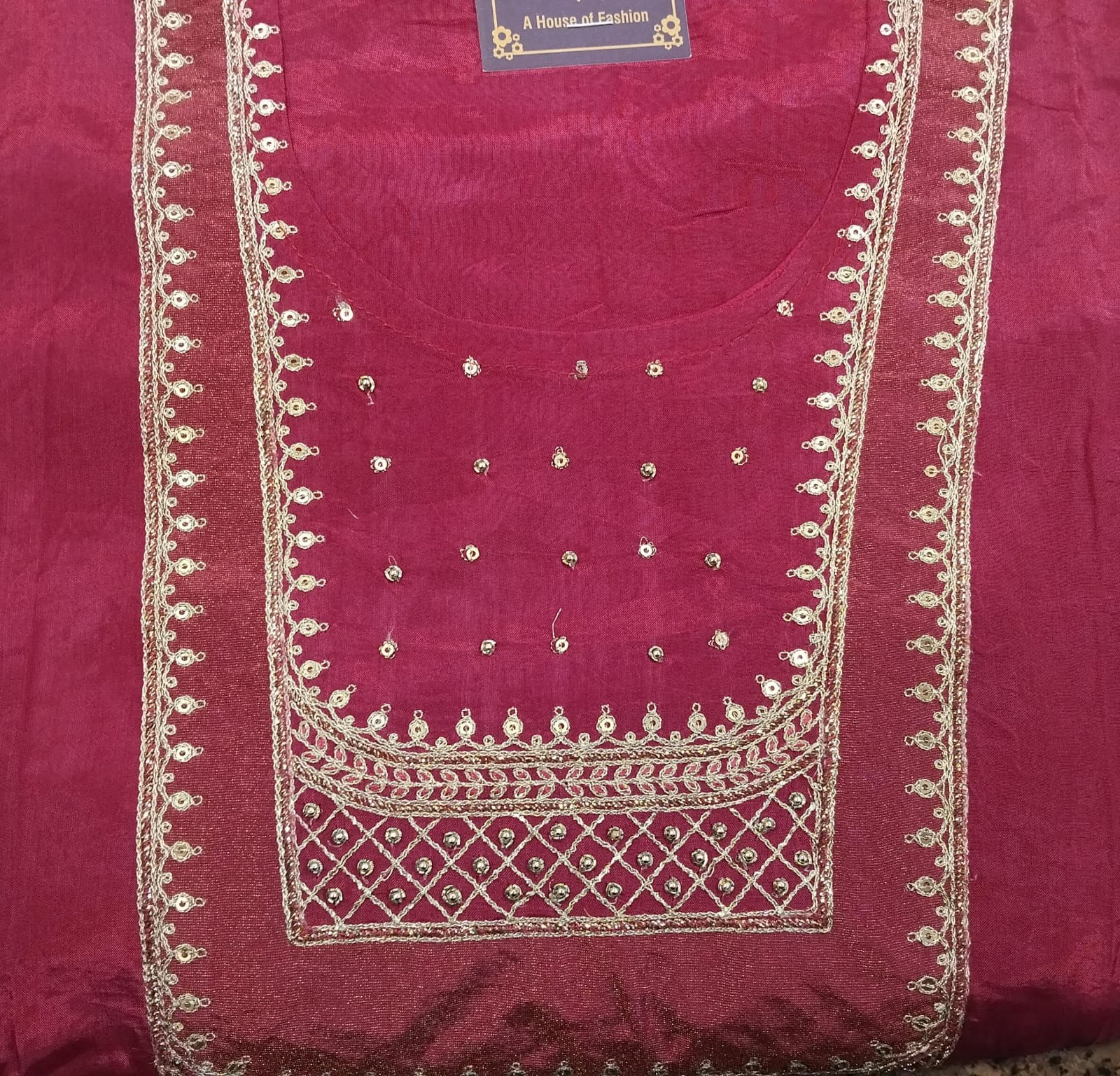 pure silk suit with zari detailing on neck with sequence highlighted pure silk suit with zari detailing on neck with sequence highlighted