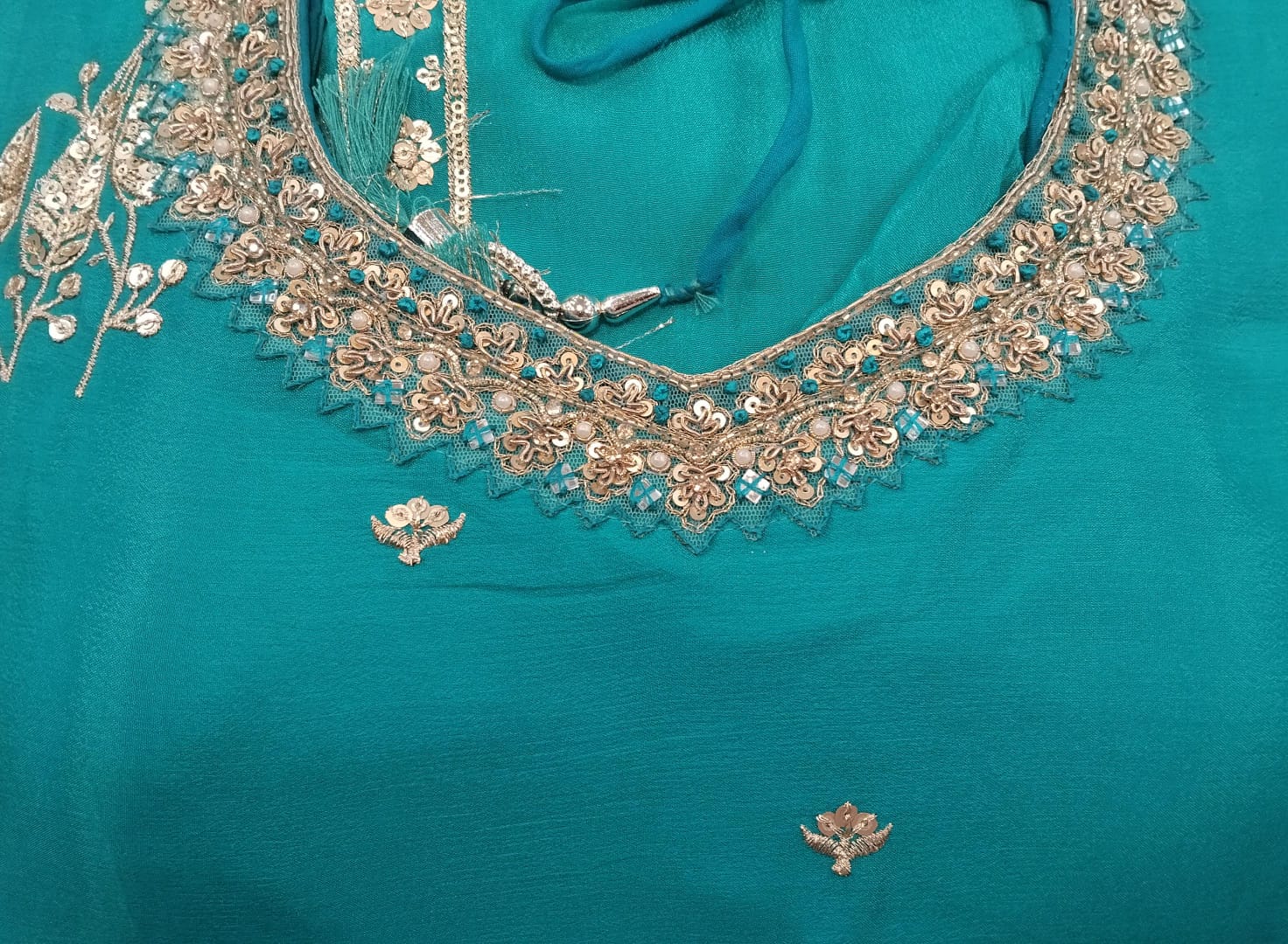 short shirt : pure chinon fabric with cut dana , sequence, french knot, pearls and siroski detailing on neck short shirt : pure chinon fabric with cut dana , sequence, french knot, pearls and siroski detailing on neck