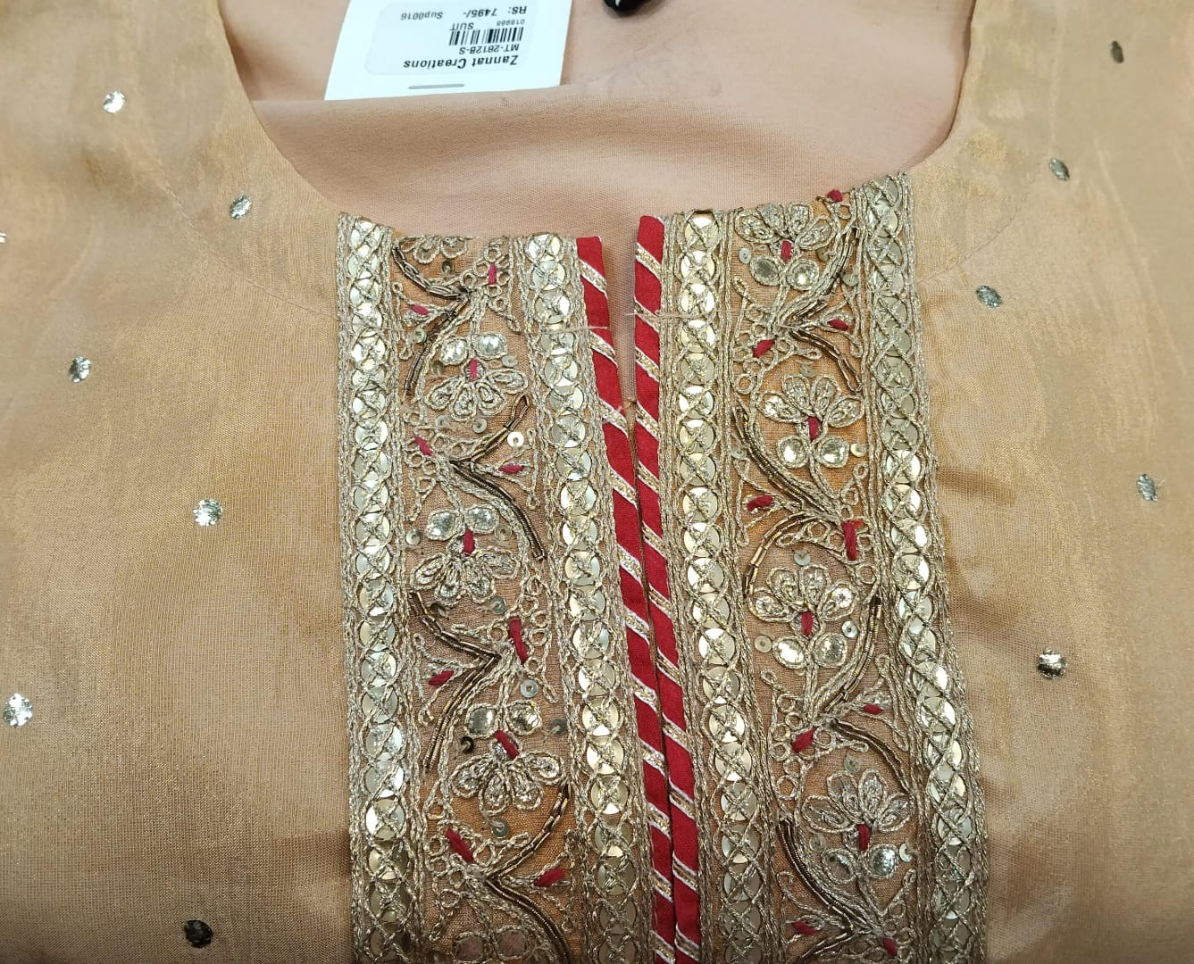 shirt : pure tissue silk fabric with dori and sequence detailing on neck also in sleeves and ghera and also buties on suit shirt : pure tissue silk fabric with dori and sequence detailing on neck also in sleeves and ghera and also buties on suit