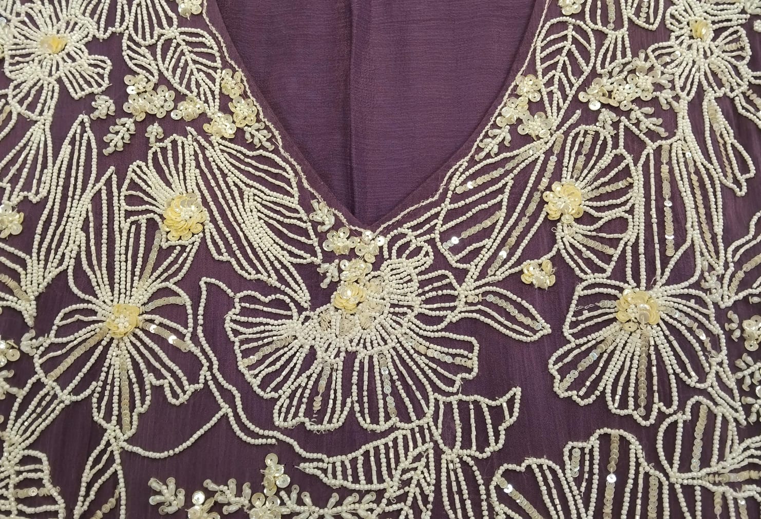 shirt : pure chinon fabric with pearls , cut dana and sequence detailing on all over and also in sleaves also buties given shirt : pure chinon fabric with pearls , cut dana and sequence detailing on all over and also in sleaves also buties given