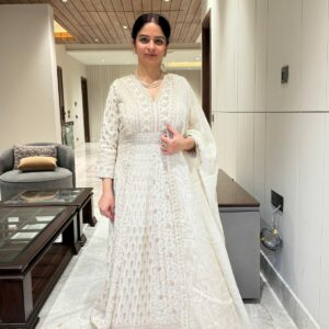 pure silk with all over zari detailing and siroski and pearls detailing on neck belt