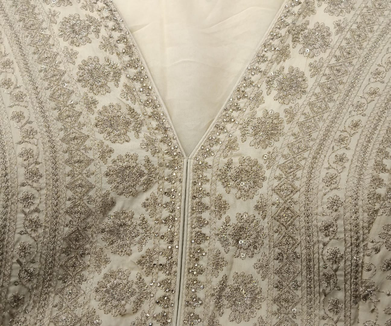 pure silk with all over zari detailing and siroski and pearls detailing on neck belt pure silk with all over zari detailing and siroski and pearls detailing on neck belt