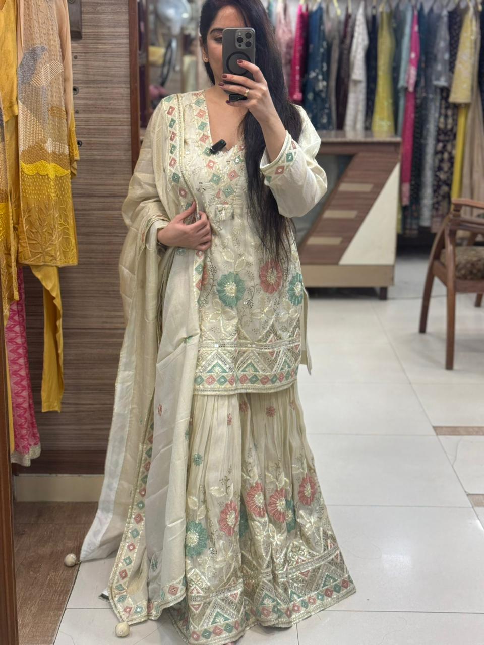 pure tissue silk fabric with siroski and gota pati detailing on all over also thread detailing flowers with back dori and tessls on neck pure tissue silk fabric with siroski and gota pati detailing on all over also thread detailing flowers with back dori and tessls on neck
