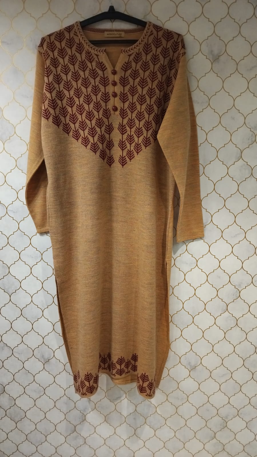 kurti pure woollen with cute buttons on neck and also print on neck and hemline kurti pure woollen with cute buttons on neck and also print on neck and hemline