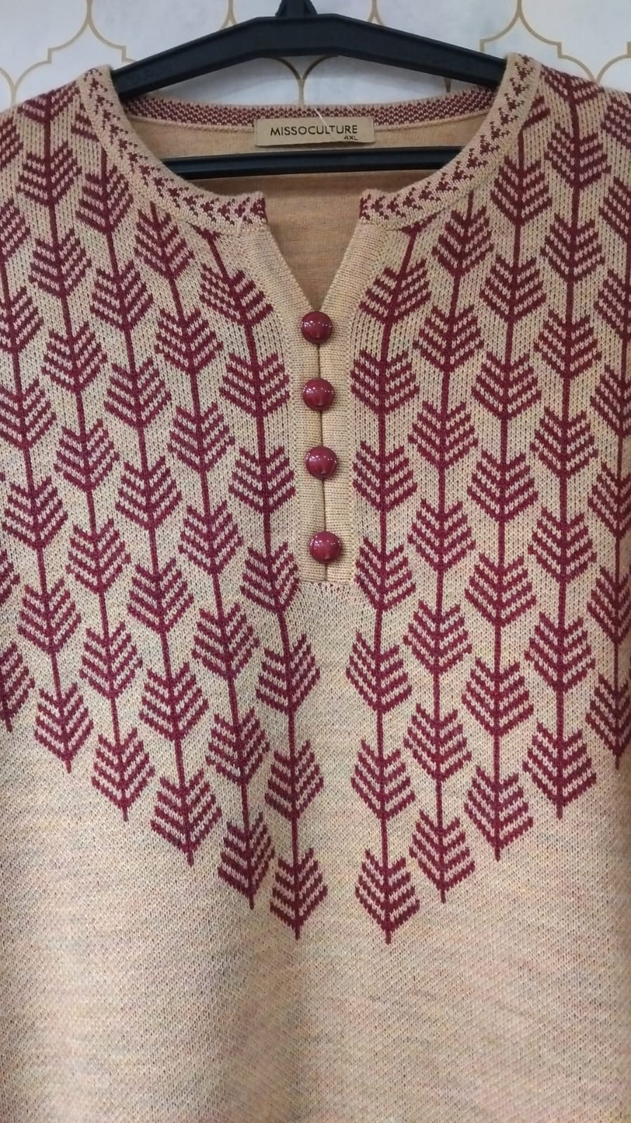 kurti pure woollen with cute buttons on neck and also print on neck and hemline kurti pure woollen with cute buttons on neck and also print on neck and hemline