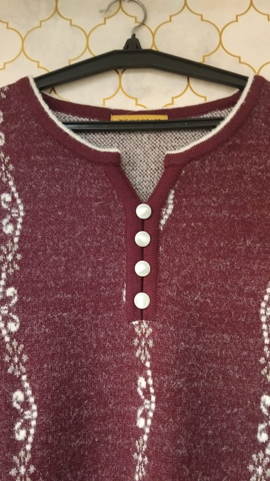 kurti pure woollen strip print and also print in hemline and sleaves with cute buttons on neck kurti pure woollen strip print and also print in hemline and sleaves with cute buttons on neck