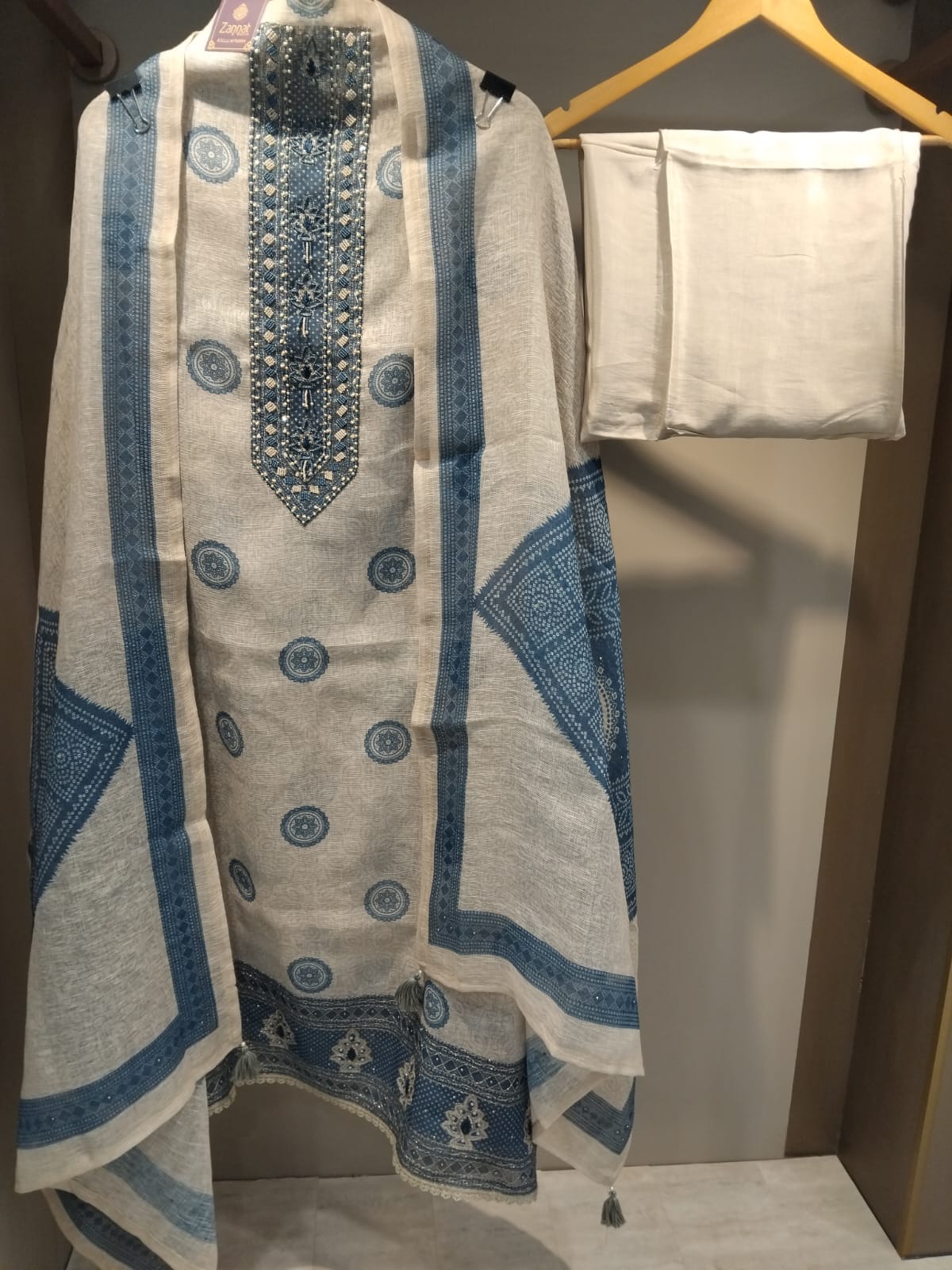 u1144 pure cotton linen with block prints neck detailing pearls and cutdana sequence highlighting lace given and zari sequence detailing embroidery on hemline u1144 pure cotton linen with block prints neck detailing pearls and cutdana sequence highlighting lace given and zari sequence detailing embroidery on hemline