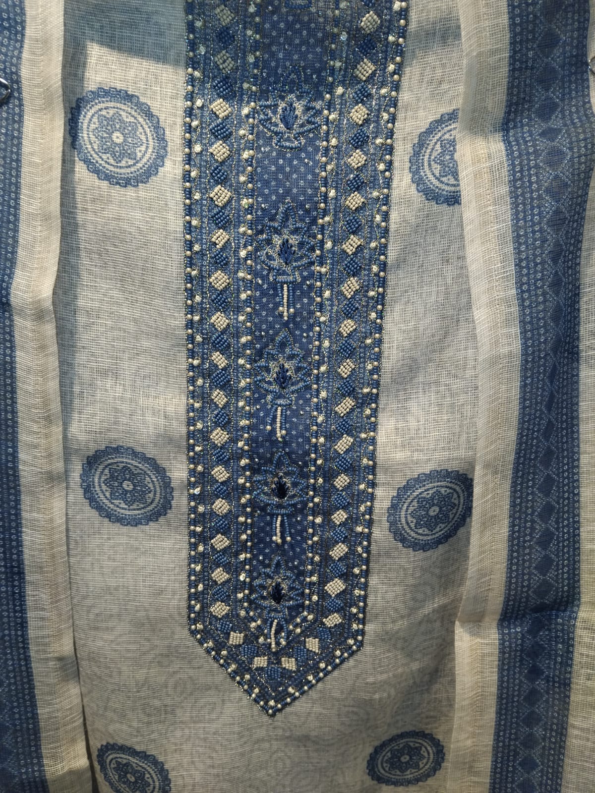 u1144 pure cotton linen with block prints neck detailing pearls and cutdana sequence highlighting lace given and zari sequence detailing embroidery on hemline u1144 pure cotton linen with block prints neck detailing pearls and cutdana sequence highlighting lace given and zari sequence detailing embroidery on hemline